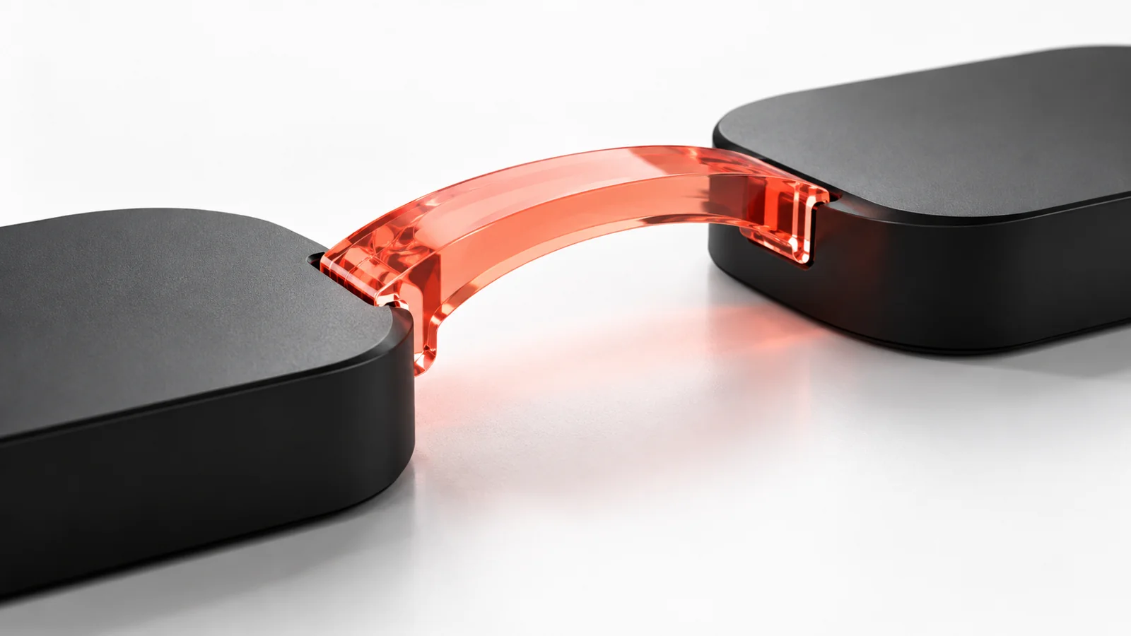 Dos piezas conectadas por un elemento rojo